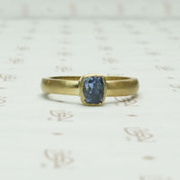 Dramatic Minimalism Cushion Cut Sapphire SolitaireDramatic Minimalism Cushion Cut Sapphire Solitaire
