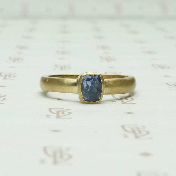 Dramatic Minimalism Cushion Cut Sapphire SolitaireDramatic Minimalism Cushion Cut Sapphire Solitaire
