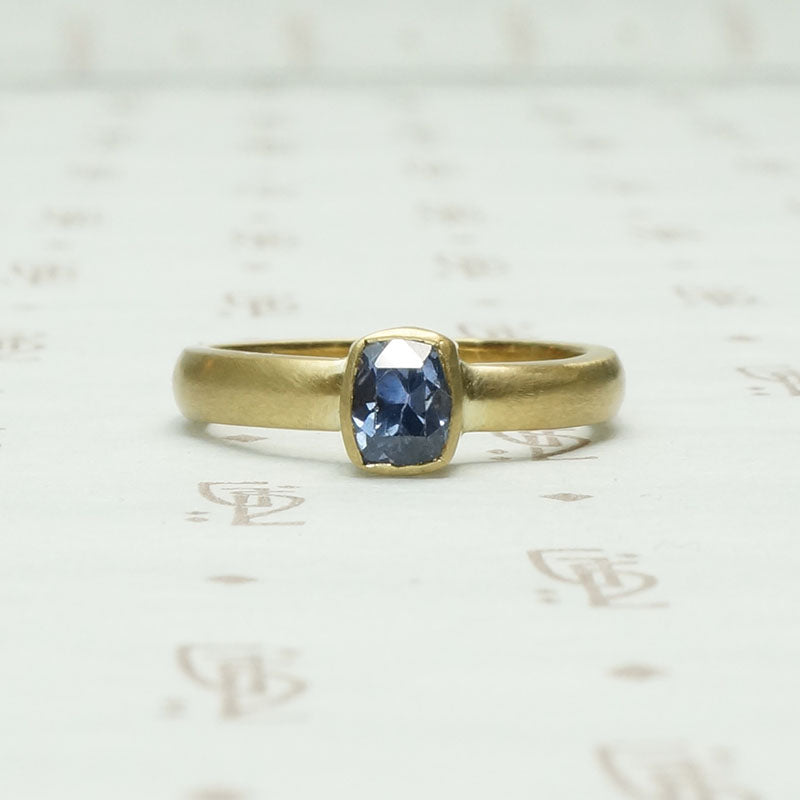 Dramatic Minimalism Cushion Cut Sapphire SolitaireDramatic Minimalism Cushion Cut Sapphire Solitaire