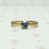 Dramatic Minimalism Cushion Cut Sapphire SolitaireDramatic Minimalism Cushion Cut Sapphire Solitaire