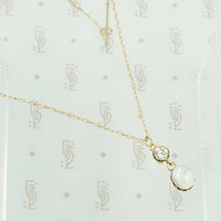 vintage moonstone and diamond gold pendant on a chain