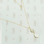 vintage moonstone and diamond gold pendant on a chain