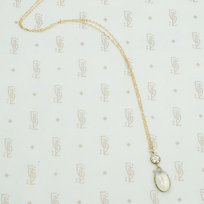 antique moonstone and .29 carat old mine cut diamond pendant