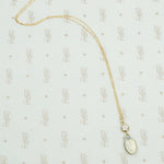 antique moonstone and .29 carat old mine cut diamond pendant