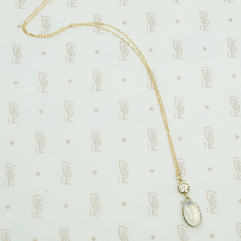 antique moonstone and .29 carat old mine cut diamond pendant