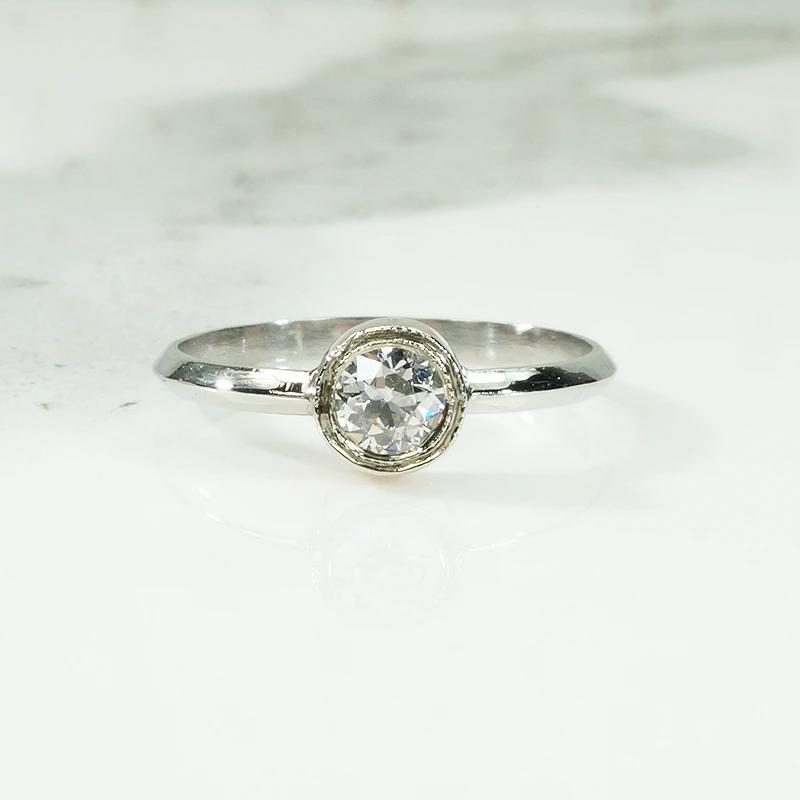 Platinum & Rose Gold Bezel Diamond Solitaire by 720