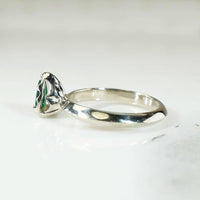 Vibrant Pear Cut Emerald Solitaire by 720