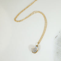 Glowing Antique Moonstone in Gold Pendant