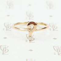 The question mark ring in rose gold with diamond by 720.
