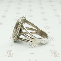 Subtle Green Turquoise in Hand Made Silver Setting