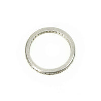 Early Platinum Diamond Eternity Band Engraved with an Arrow Design