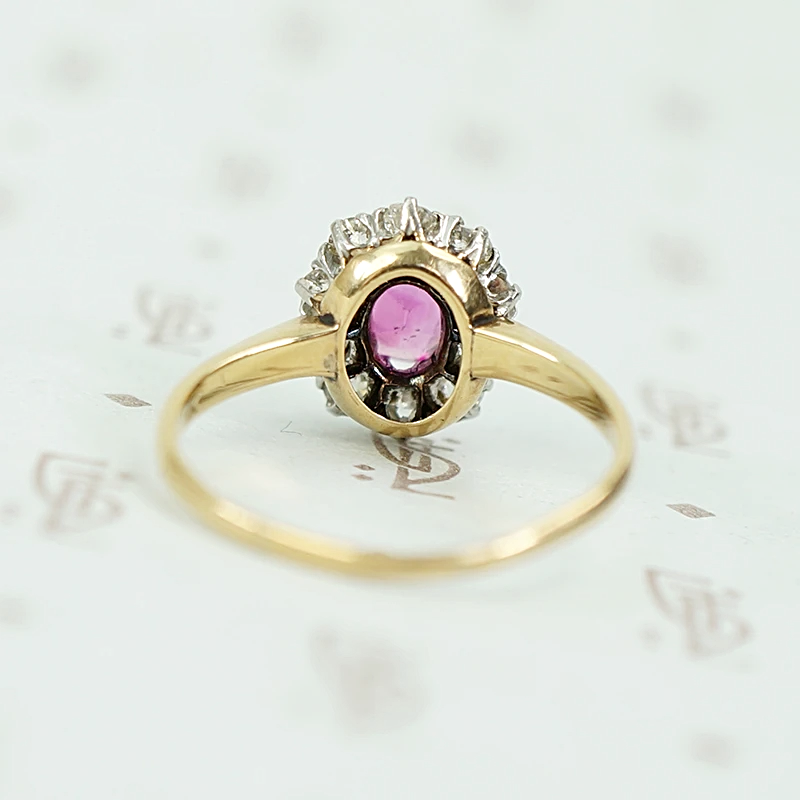 Enchanting Antique Ruby Halo Ring