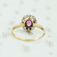 Enchanting Antique Ruby Halo Ring