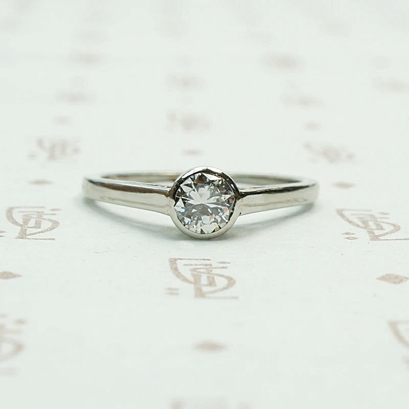 1920s White Gold Bezel Set Diamond Solitaire