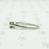 1920s White Gold Bezel Set Diamond Solitaire. Left View.