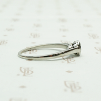 1920s White Gold Bezel Set Diamond Solitaire. Right view.