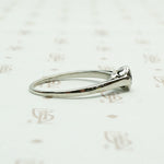 1920s White Gold Bezel Set Diamond Solitaire. Right view.
