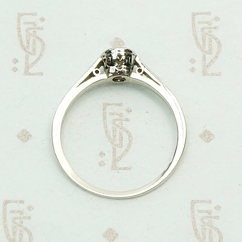 1920s White Gold Bezel Set Diamond Solitaire. Top view.