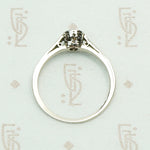 1920s White Gold Bezel Set Diamond Solitaire. Top view.