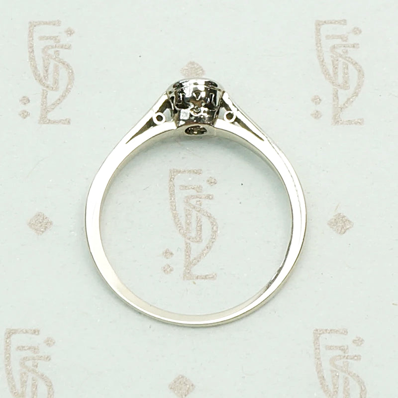 1920s White Gold Bezel Set Diamond Solitaire. Top view.