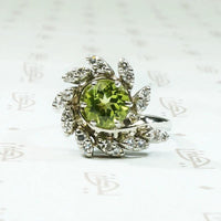 Vivacious Peridot Cocktail Ring with Diamond Swirl
