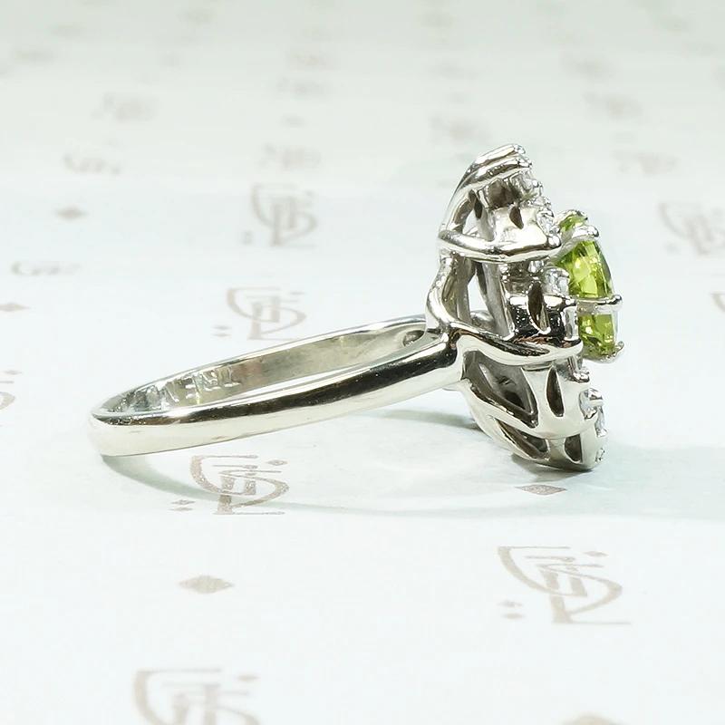 Vivacious Peridot Cocktail Ring with Diamond Swirl