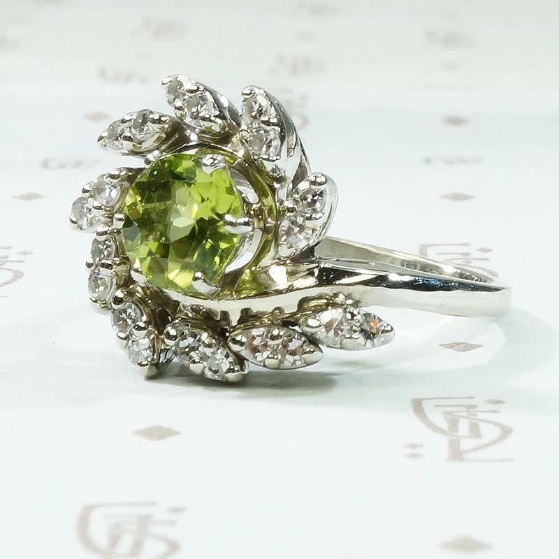 Vivacious Peridot Cocktail Ring with Diamond Swirl