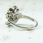 Vivacious Peridot Cocktail Ring with Diamond Swirl