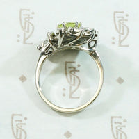 Vivacious Peridot Cocktail Ring with Diamond Swirl