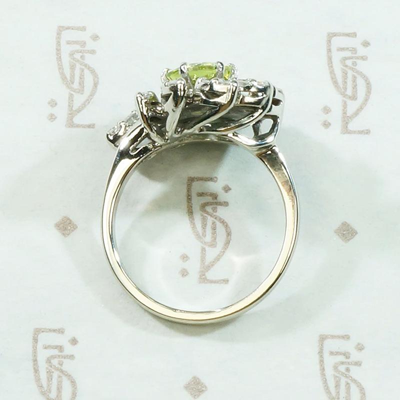 Vivacious Peridot Cocktail Ring with Diamond Swirl