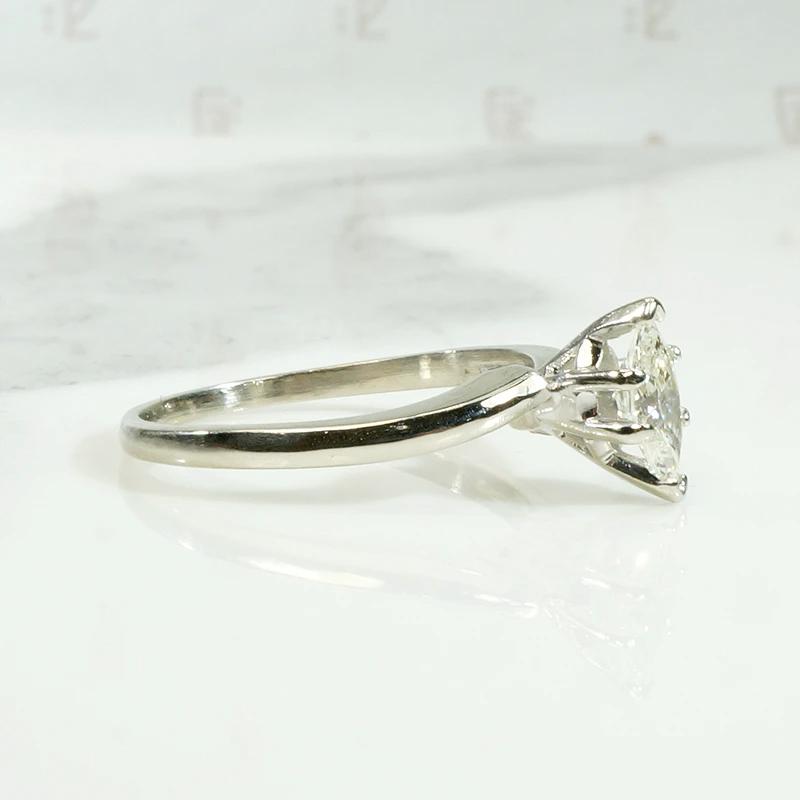 Sophisticated Mid Century Marquis Diamond Solitaire