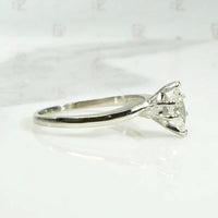Sophisticated Mid Century Marquis Diamond Solitaire