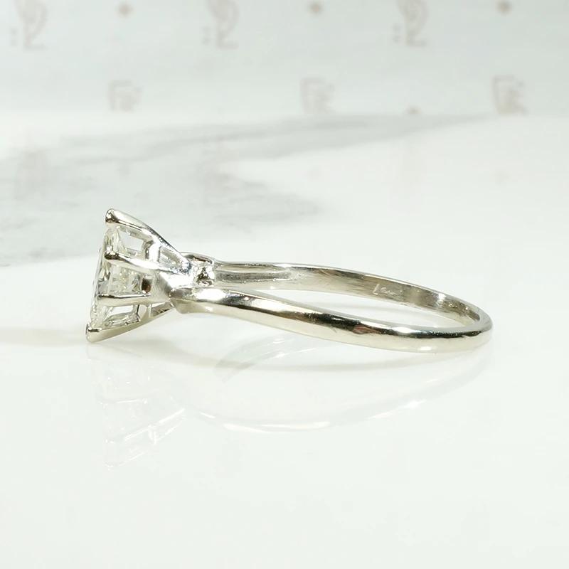 Sophisticated Mid Century Marquis Diamond Solitaire