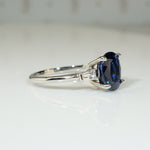Deep Blue Oval Sapphire and Diamond Platinum Engagement Ring