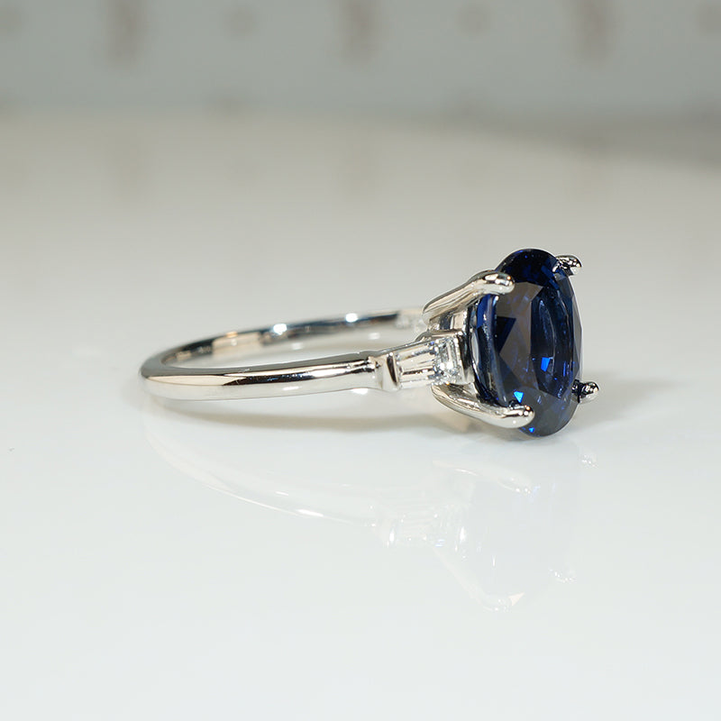 Deep Blue Oval Sapphire and Diamond Platinum Engagement Ring