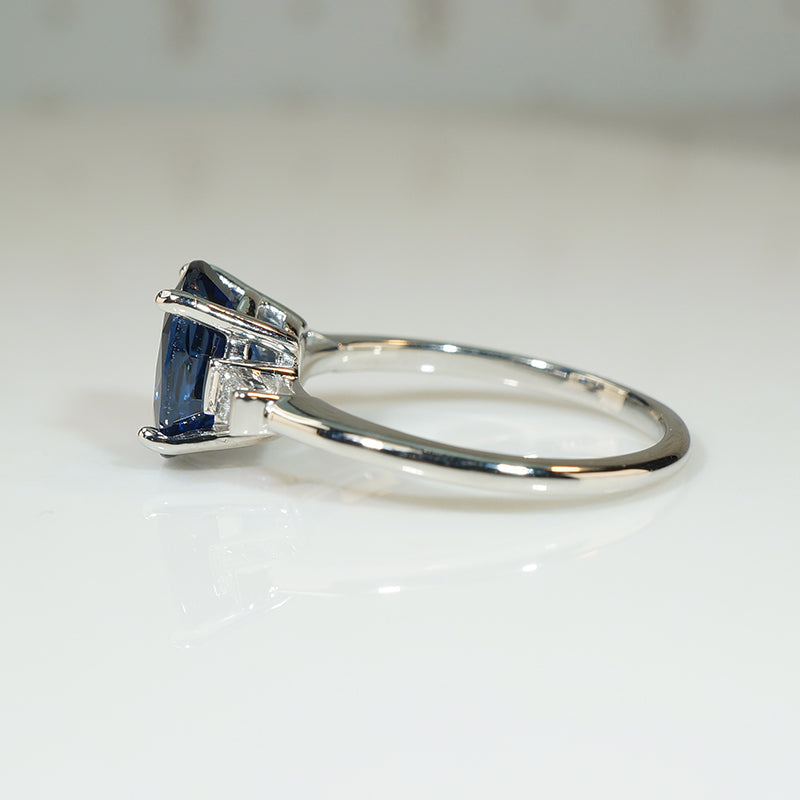 Deep Blue Oval Sapphire and Diamond Platinum Engagement Ring