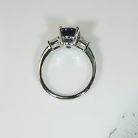 Deep Blue Oval Sapphire and Diamond Platinum Engagement Ring