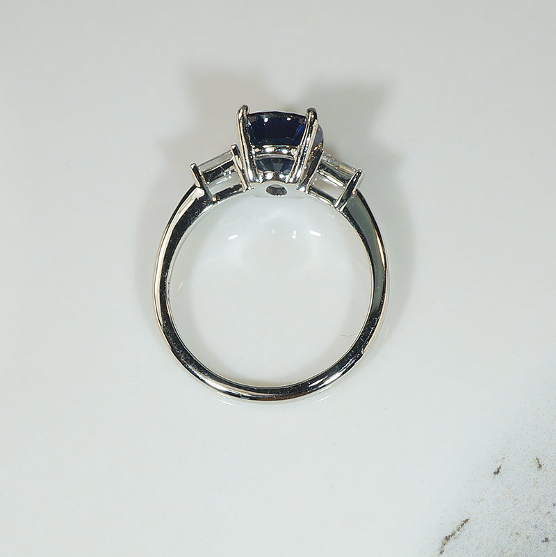 Deep Blue Oval Sapphire and Diamond Platinum Engagement Ring