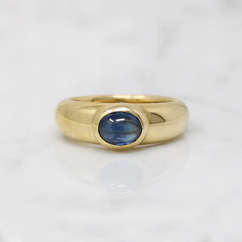Regal Sapphire Cabochon in Curvaceous 18k Ring