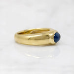 Regal Sapphire Cabochon in Curvaceous 18k Ring