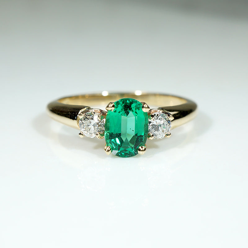Irresistible Oval Emerald Ring with Diamond Accents