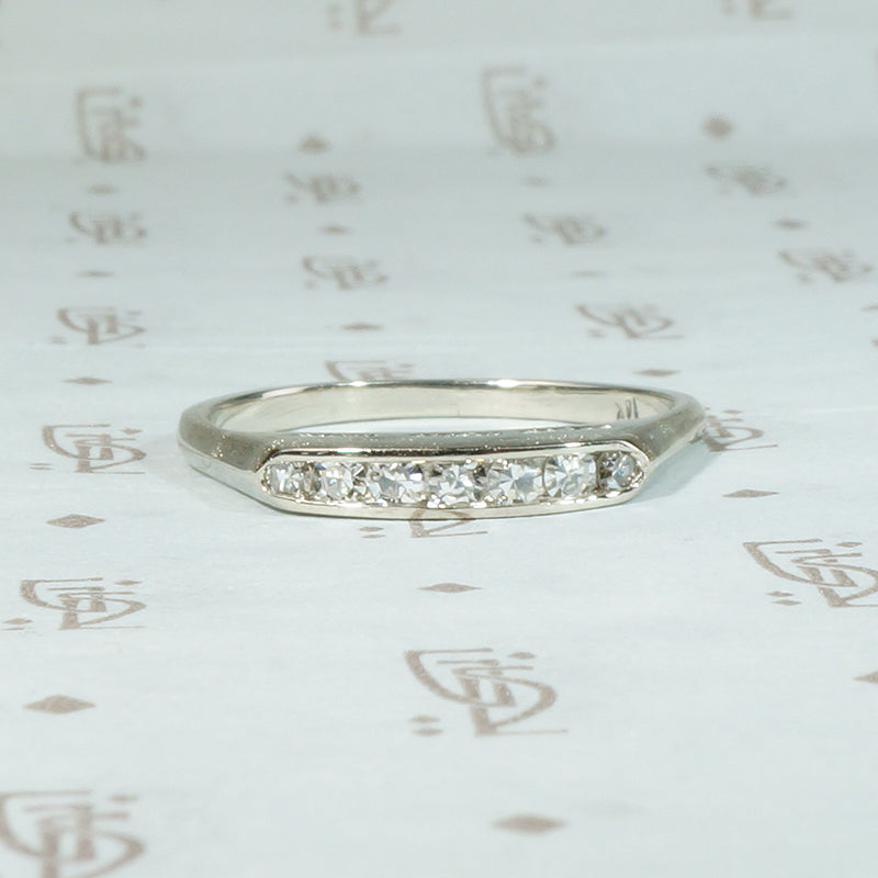 Crisp Seven Diamond & White Gold Wedding Band