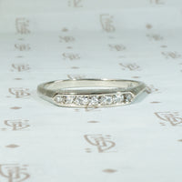 Crisp Seven Diamond & White Gold Wedding Band