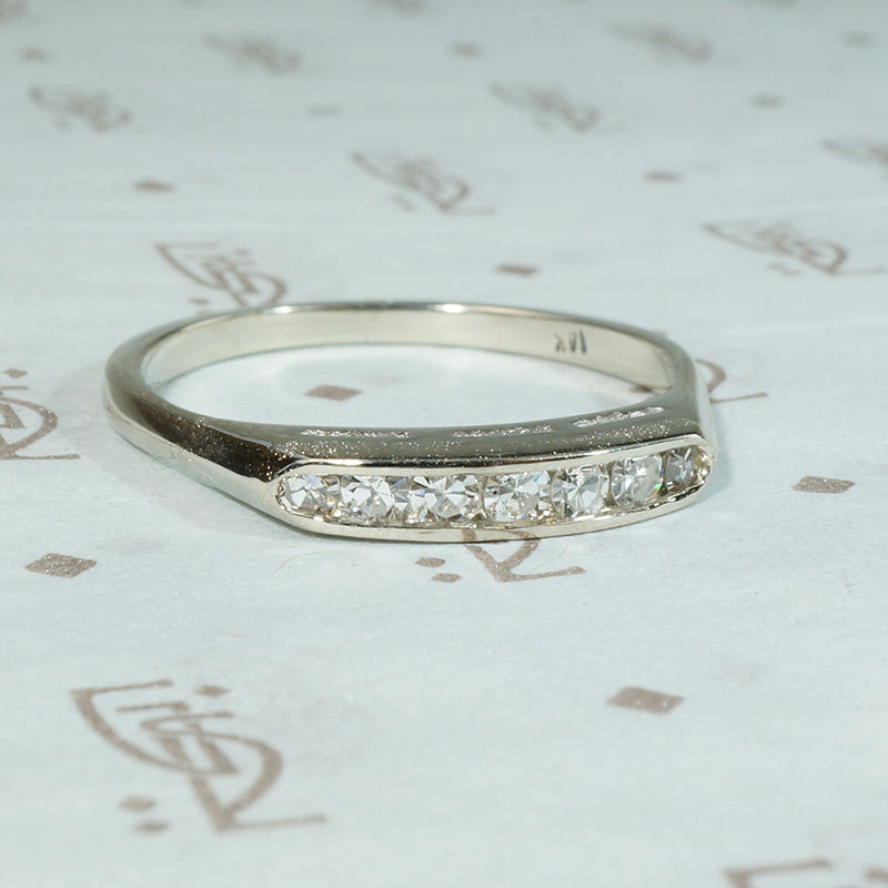 Crisp Seven Diamond & White Gold Wedding Band