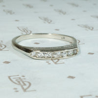 Crisp Seven Diamond & White Gold Wedding Band