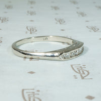 Crisp Seven Diamond & White Gold Wedding Band