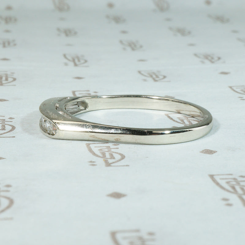 Crisp Seven Diamond & White Gold Wedding Band