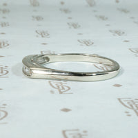 Crisp Seven Diamond & White Gold Wedding Band