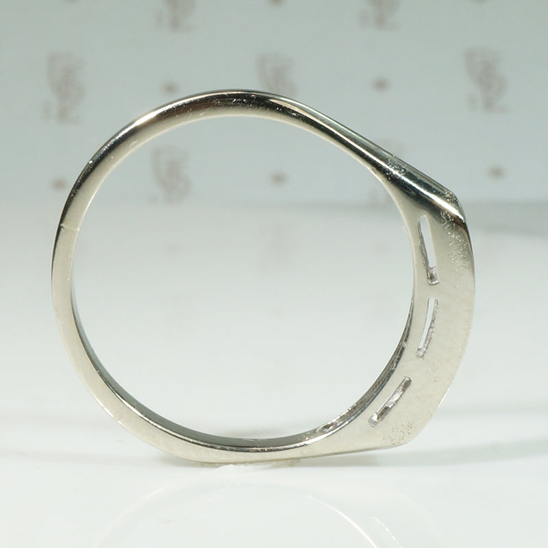 Crisp Seven Diamond & White Gold Wedding Band