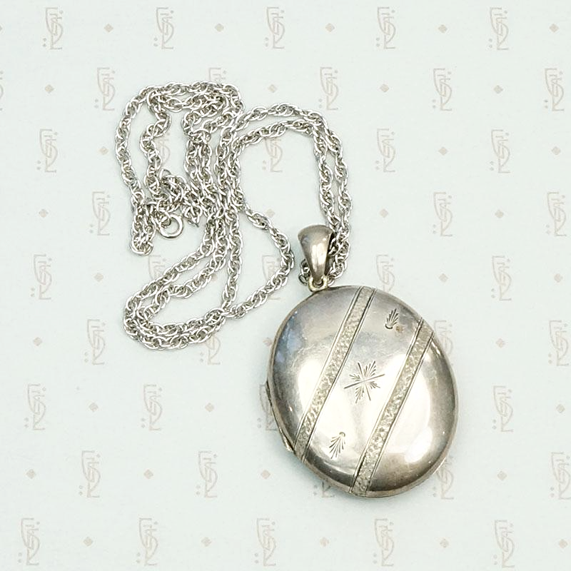 Buckle Engraved Silver Victorian Locket, back view.